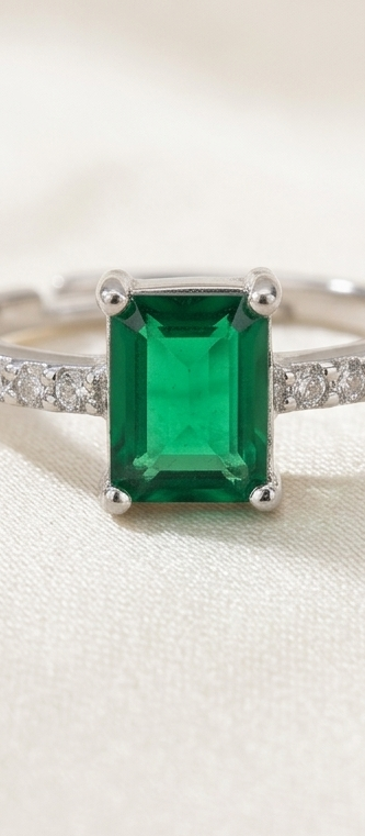 Silver-Plated Emerald-Cut Green CZ Solitaire Ring with Pavé Band