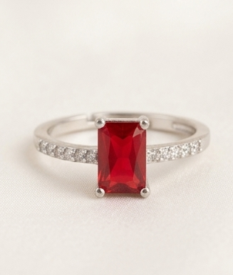 Silver-Plated Emerald-Cut Ruby Red CZ Solitaire Ring with Pavé Band