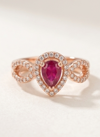 Rose Gold Teardrop Ruby Red CZ Halo Ring with Infinity Twist Band