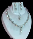 NECKLESS AND SILVER EARRING SET
